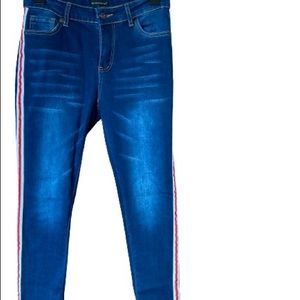 Women’s jeans with red and white stripes